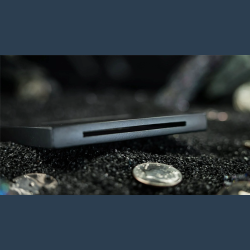 Coin Thru Anything by Nathan Kranzo