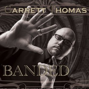 Banded 25 mm by Garrett Thomas and Kozmomagic