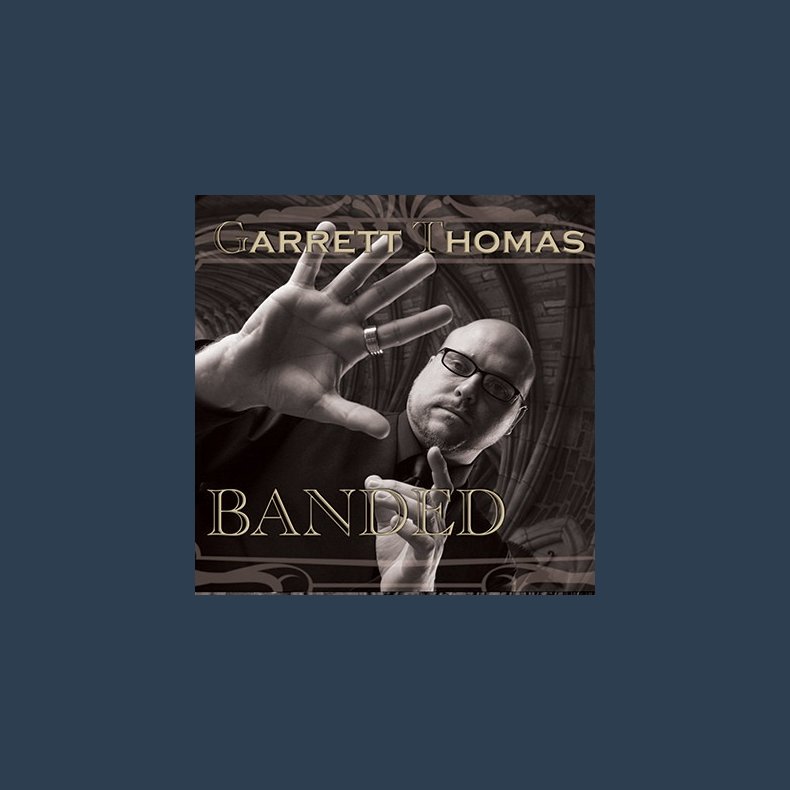 Banded 25 mm by Garrett Thomas and Kozmomagic
