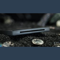 Coin Thru Anything by Nathan Kranzo